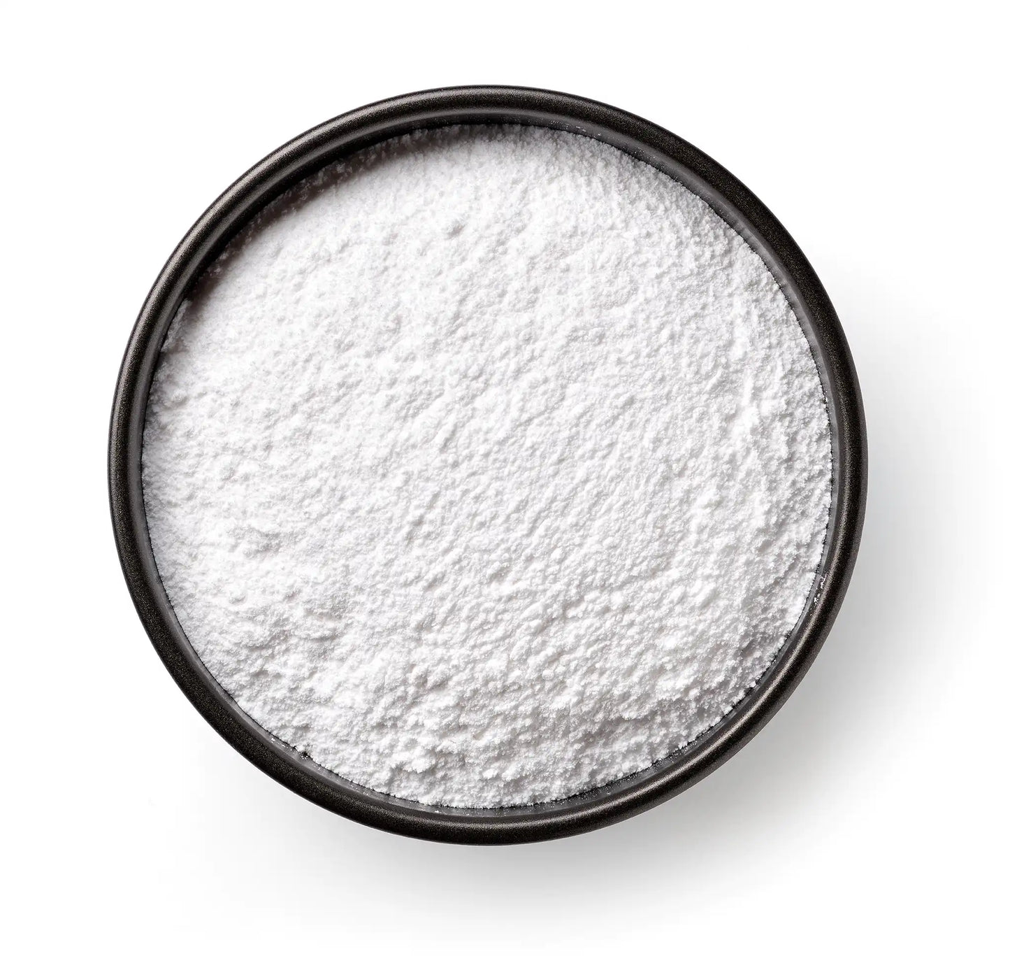 Textura de Zeopet: polvo blanco del Suplemento Mineral Avanzado en un cuenco negro.