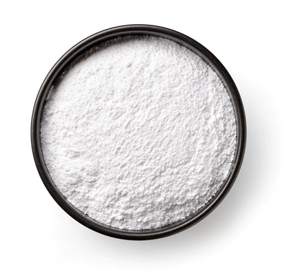 Textura de Zeopet: polvo blanco del Suplemento Mineral Avanzado en un cuenco negro.